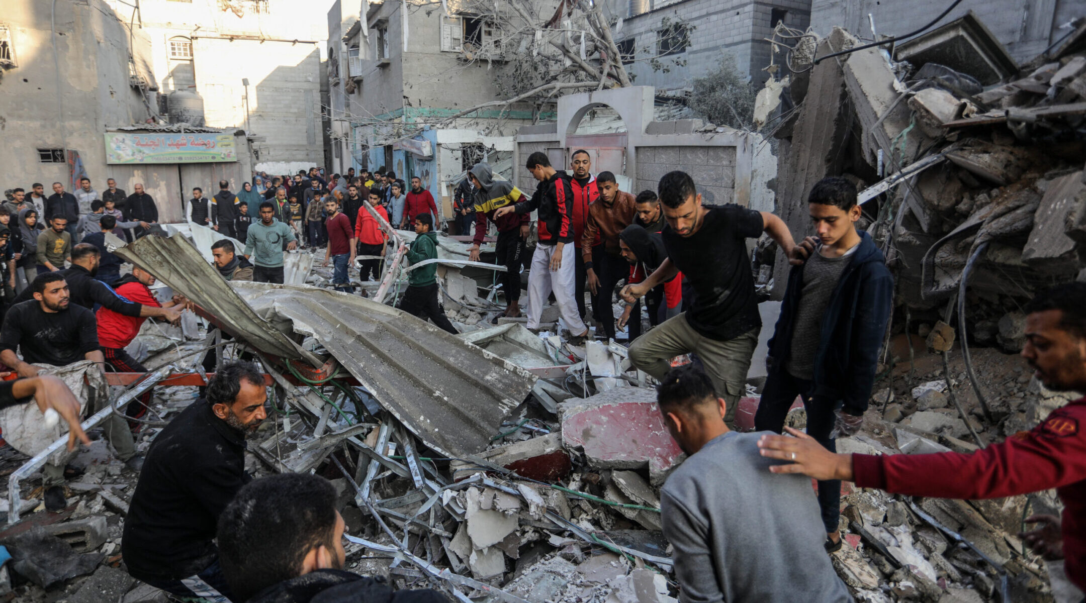 Palestinians look for survivors after an Israeli airstrike on a house belonging to the Adwan family in Rafah in the southern Gaza Strip, Dec. 1, 2023. (Abed Rahim Khatib/dpa via Getty Images)