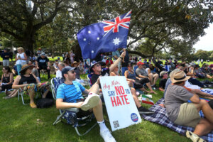 Protesters hold placards and flags during a rally against antisemitism at The Domain in Sydney, Australia, on Feb. 18, 2024. (Lisa Maree Williams/Getty Images)