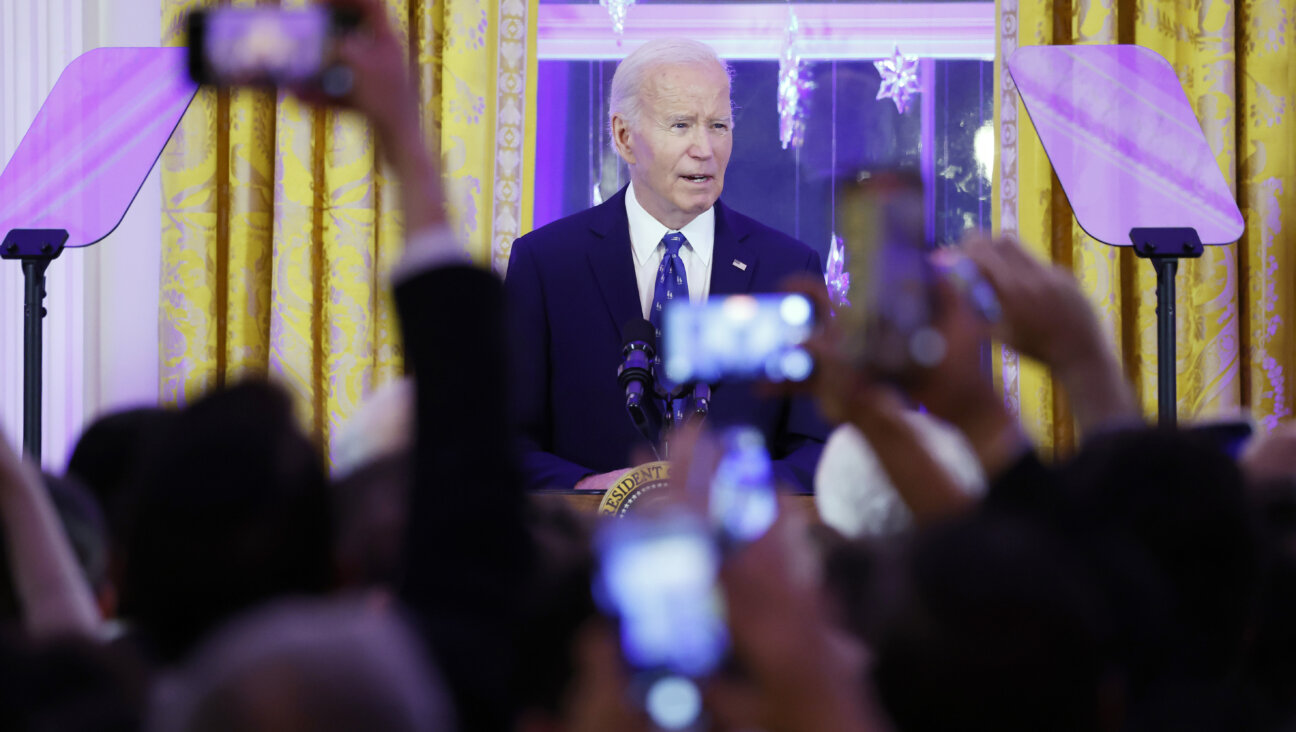 President Joe Biden speaks at the White House Hanukkah party on Dec. 16. While Biden prioritized the fight against antisemitism, his administration punted on some of the thorniest questions about the line between legitimate political speech and bigotry.