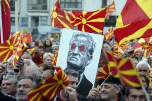 George Soros, depicted on a poster at a demonstration in Macedonia in 2017, was is among the targets of the Heritage Foundation's Project Esther.