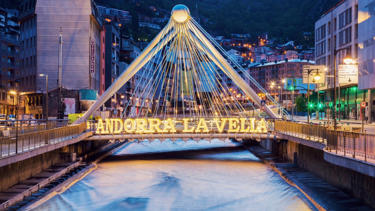 The Gran Valira river and Pont de Paris stand at the heart of the tourist hub of Andorra la Vella, Andorra. (Getty Images)