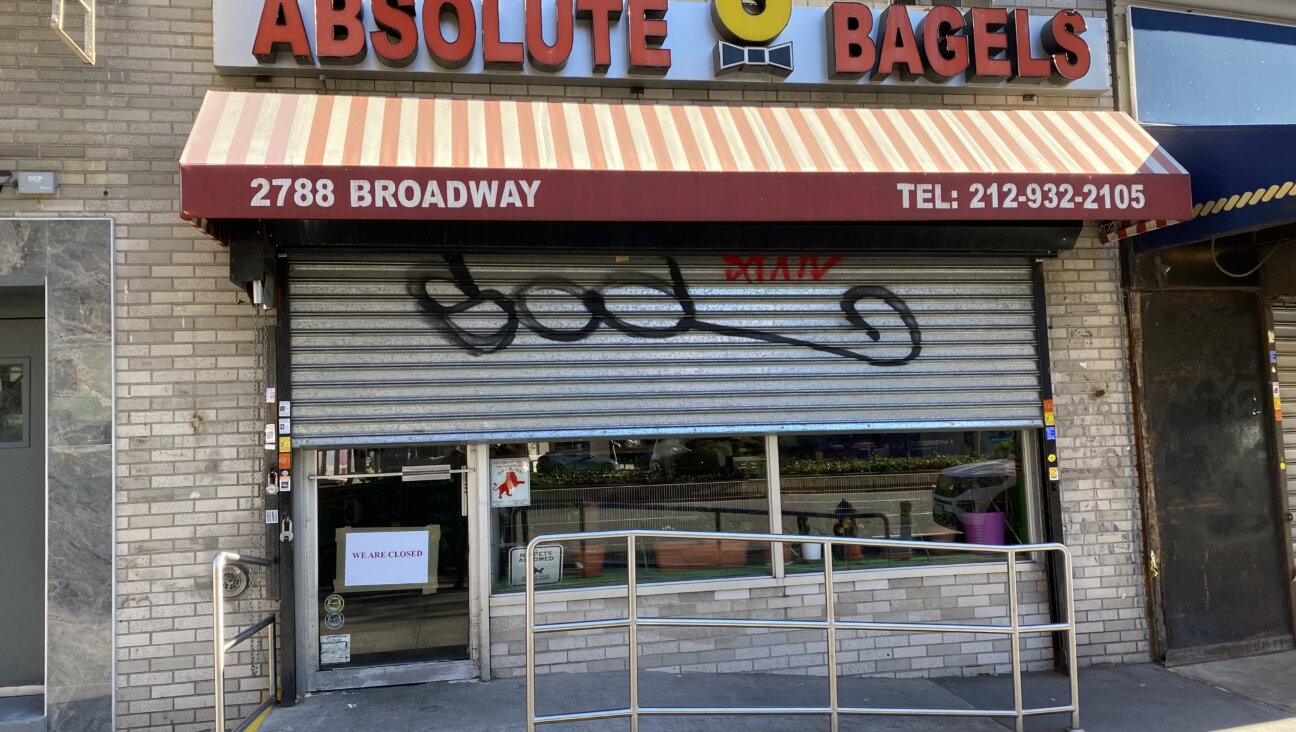 Absolute Bagels at 108th and Broadway shuttered its doors Thursday morning — at least low enough for workers to duck in and out.