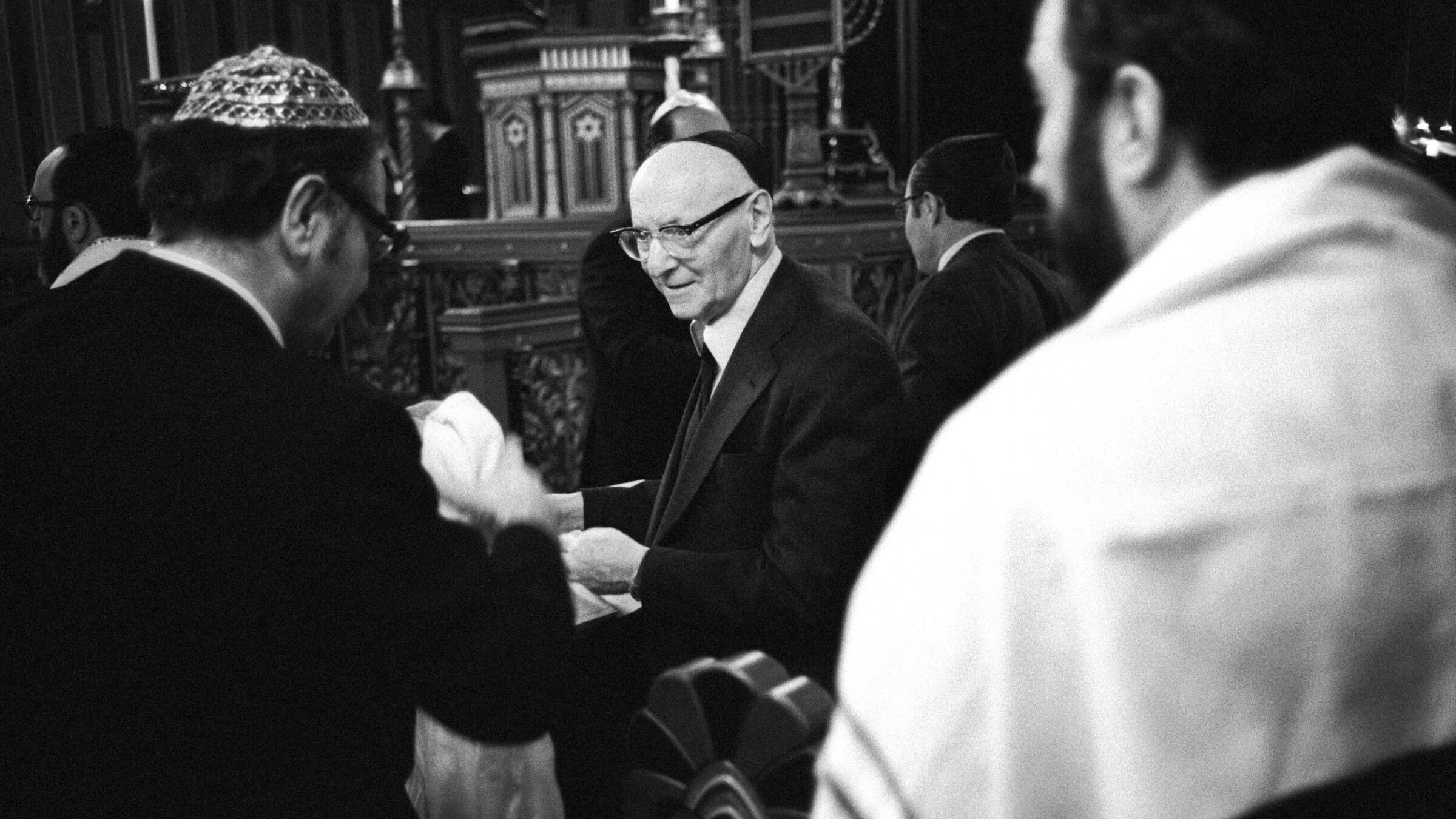 Polish-born American author Isaac Bashevis Singer attends Shabbat services at a synagogue in Stockholm, Sweden, the morning of December 9, 1978. He was in Stockholm to receive the Nobel Prize in Literature, which was awarded at a ceremony the following day.