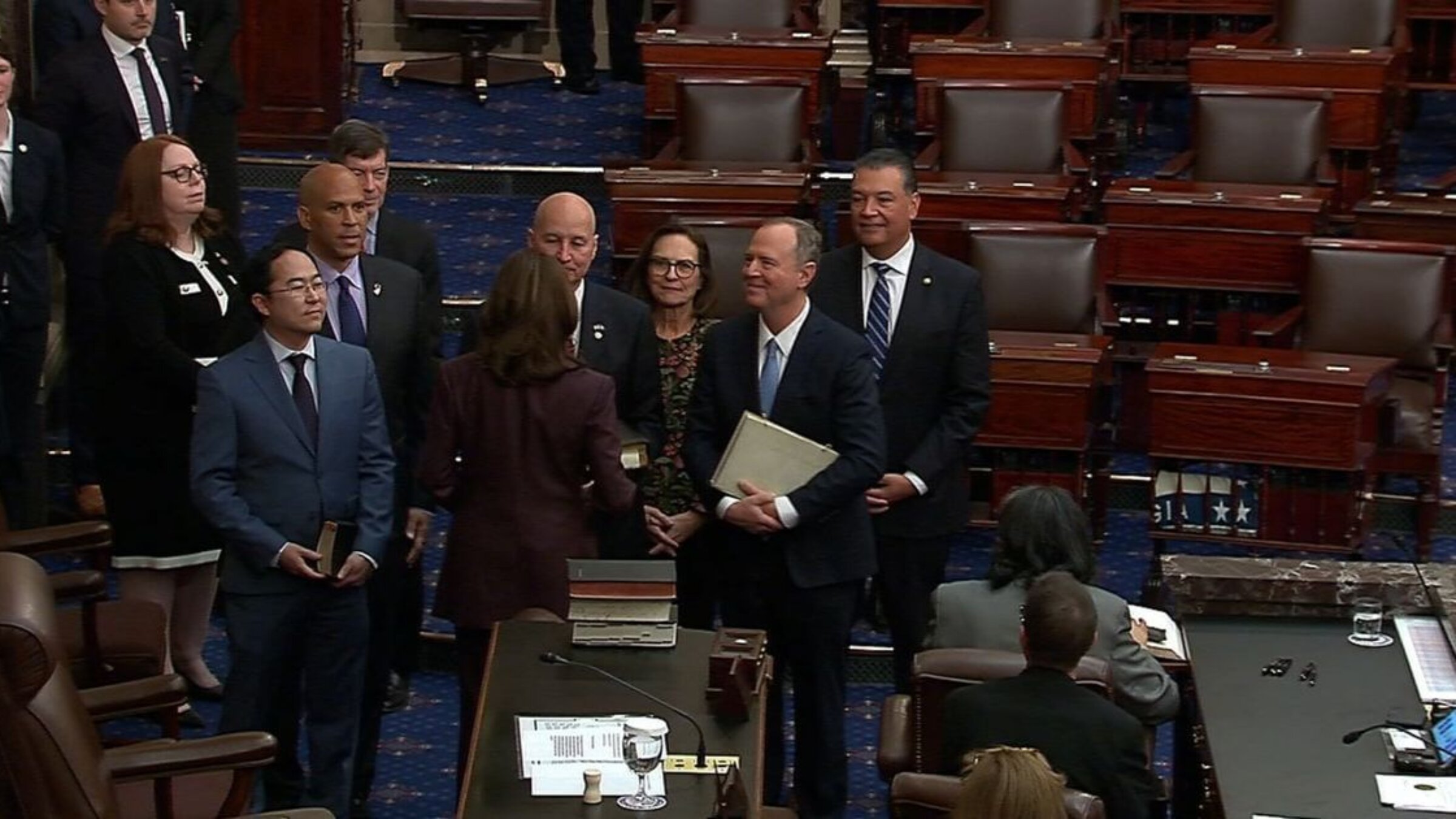 Senator Adam Schiff is sworn in to the U.S. Senate holding a Maimonides Mishneh Torah.