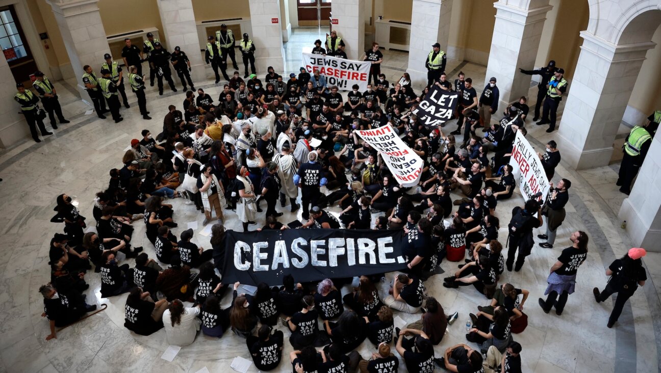 Demonstrators from Jewish Voice for Peace and the IfNotNow movement hold a rally demanding a ceasefire in Gaza in the rotunda of the Cannon House Office Building in Washington, D.C. on Oct. 18, 2023. (Chip Somodevilla/Getty Images)