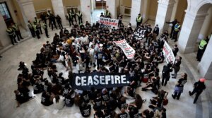 Demonstrators from Jewish Voice for Peace and the IfNotNow movement hold a rally demanding a ceasefire in Gaza in the rotunda of the Cannon House Office Building in Washington, D.C. on Oct. 18, 2023. (Chip Somodevilla/Getty Images)