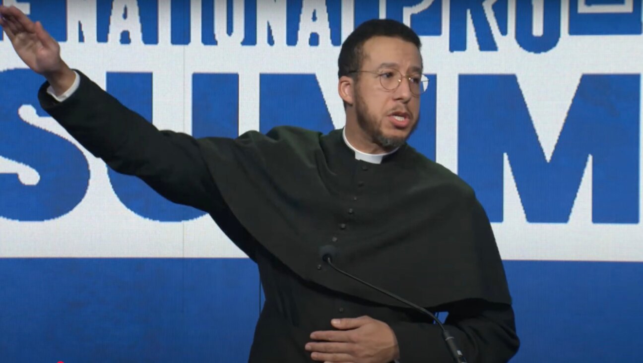 Father Calvin Robinson delivers Elon Musk’s salute at the National Pro-Life Summit, Jan. 25, 2025, in Washington, DC. (Screenshot via YouTube)