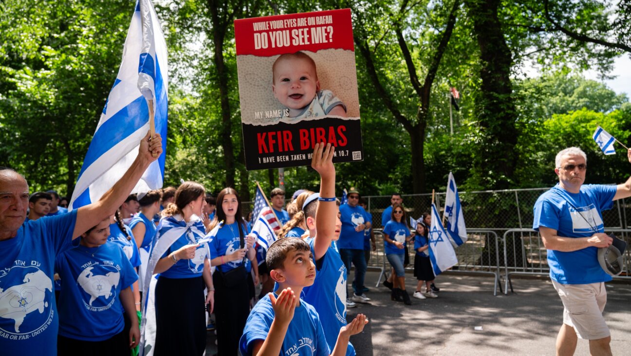 Participants in the Israel parade in New York City demand the release of Hamas hostage Kfir Bibas, June 2, 2024. (Luke Tress)