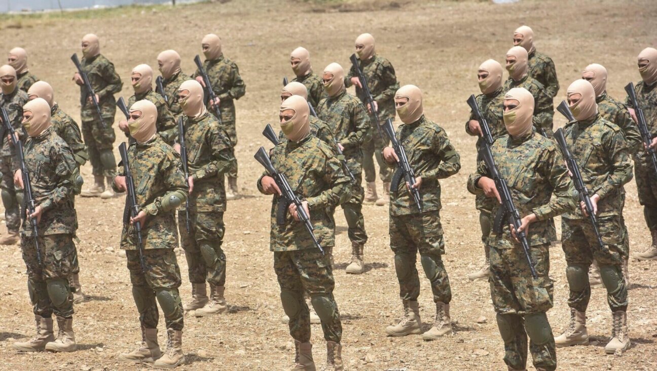 Lebanese Hezbollah fighters train to take part in cross-border raids in Aaramta bordering Israel on May 21, 2023. (Fadel Itani/NurPhoto via Getty Images)