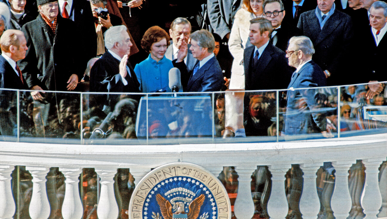 US President Jimmy Carter takes the Oath of Office by the US Capitol on Inauguration Day, January 20, 1977