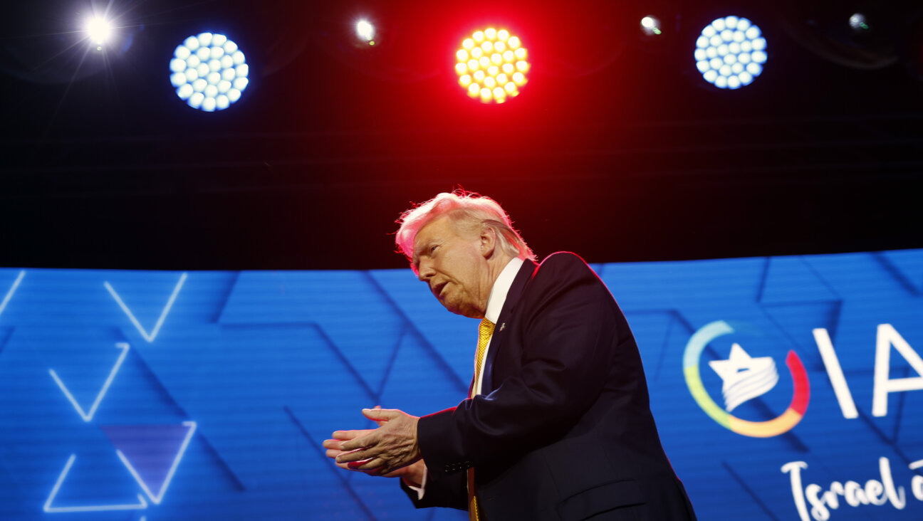 President Donald Trump leaves the stage after speaking at the Israeli American Council National Summit at the Washington Hilton in September.