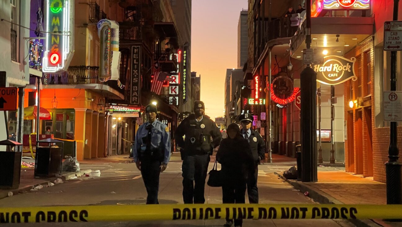 Police cordon off the area around the site of the overnight attack in the French Quarter of New Orleans on Jan. 1, 2025. (Matthew HINTON / AFP)