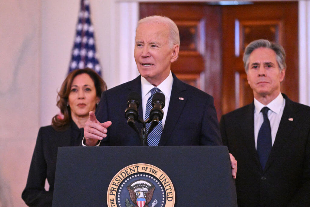 US President Joe Biden, alongside Vice President Kamala Harris (left) and Secretary of State Antony Blinken, speaks about the Israel-Hamas ceasefire and hostage release deal in the Grand Foyer of the White House on January 15, 2025.  