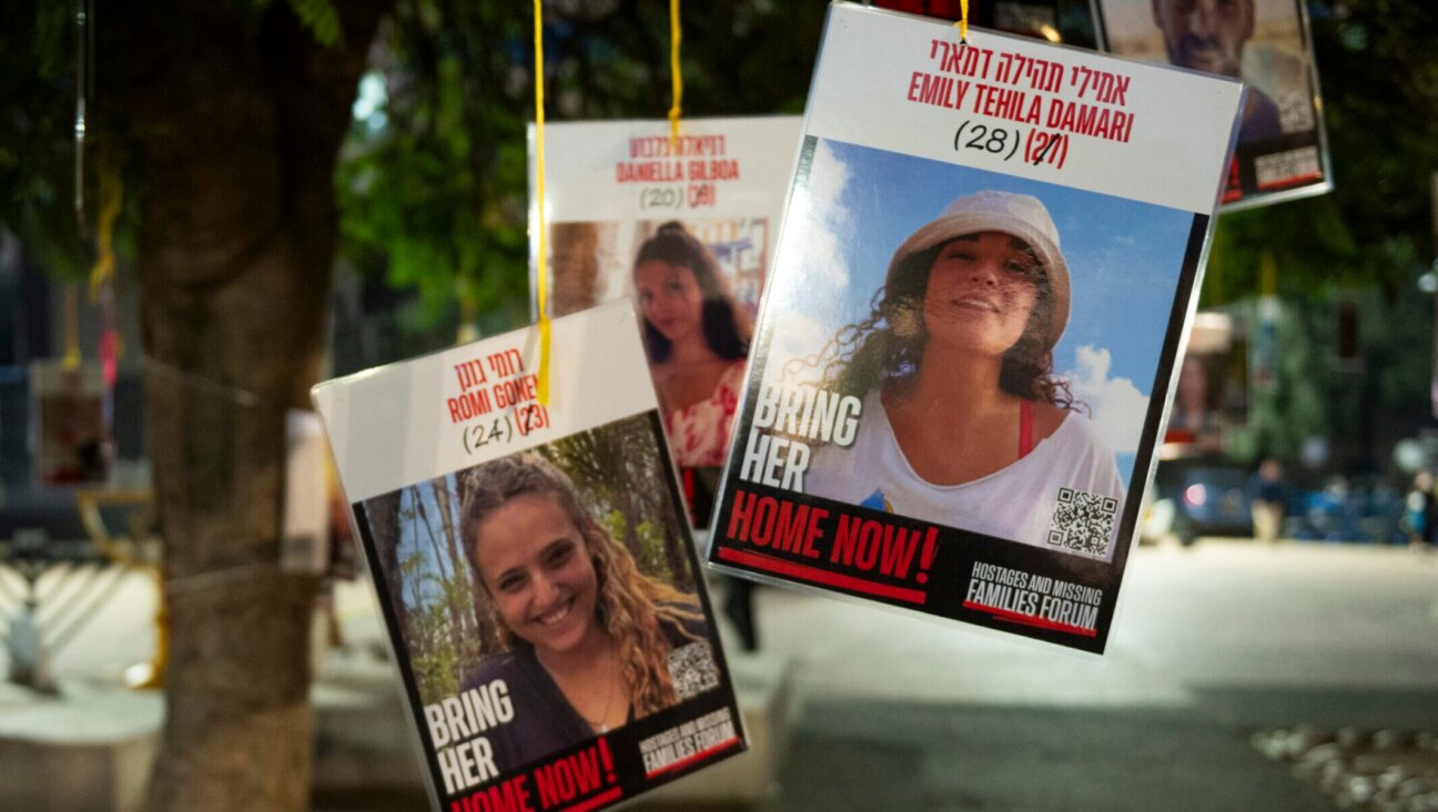 Posters of hostages Emily Damari and Romi Gonen, two of the first hostages Hamas said it would release from Gaza, are displayed at Tel Aviv’s Hostage Square, Jan. 16, 2025. (Noam Galai/Getty Images)