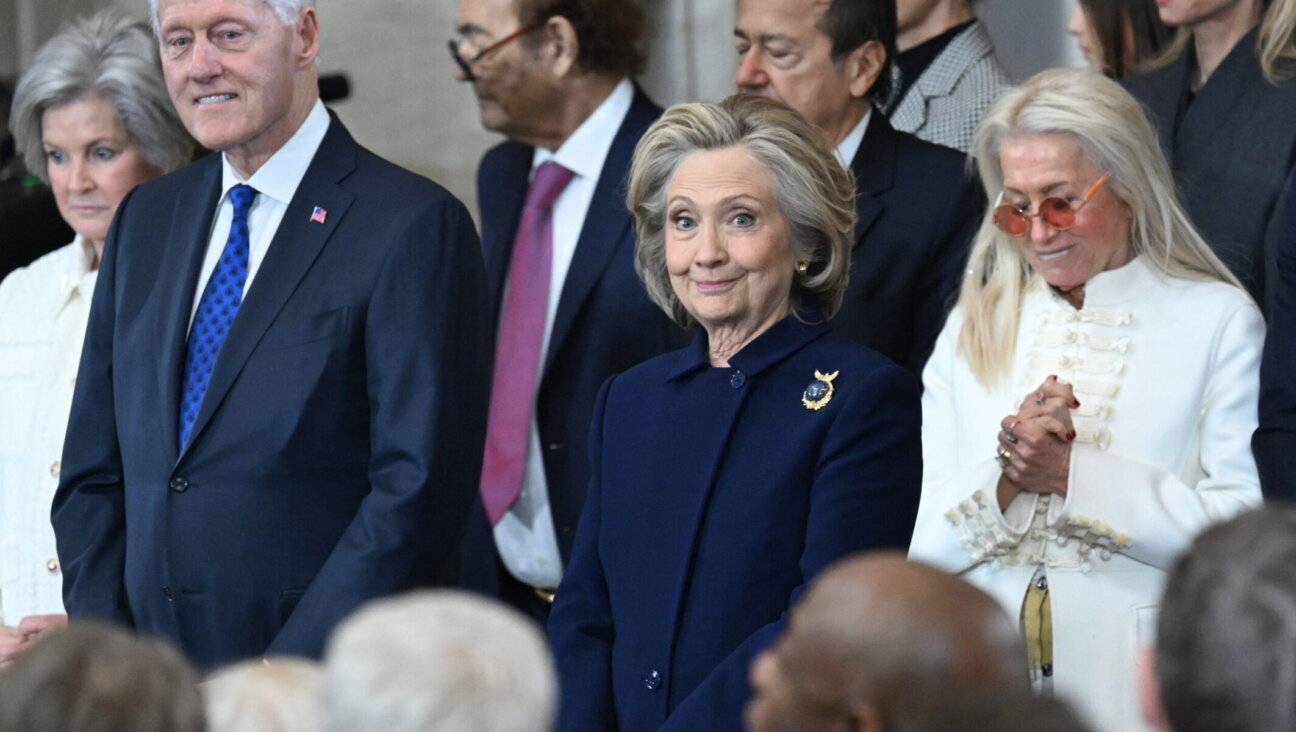 Former US Secretary of State Hillary Clinton stands next to Miriam Adelson as they attend the inauguration ceremony before Donald Trump is sworn in as the 47th US President in the US Capitol Rotunda in Washington, DC, Jan. 20, 2025. (Saul Loeb/Pool/AFP via Getty Images)