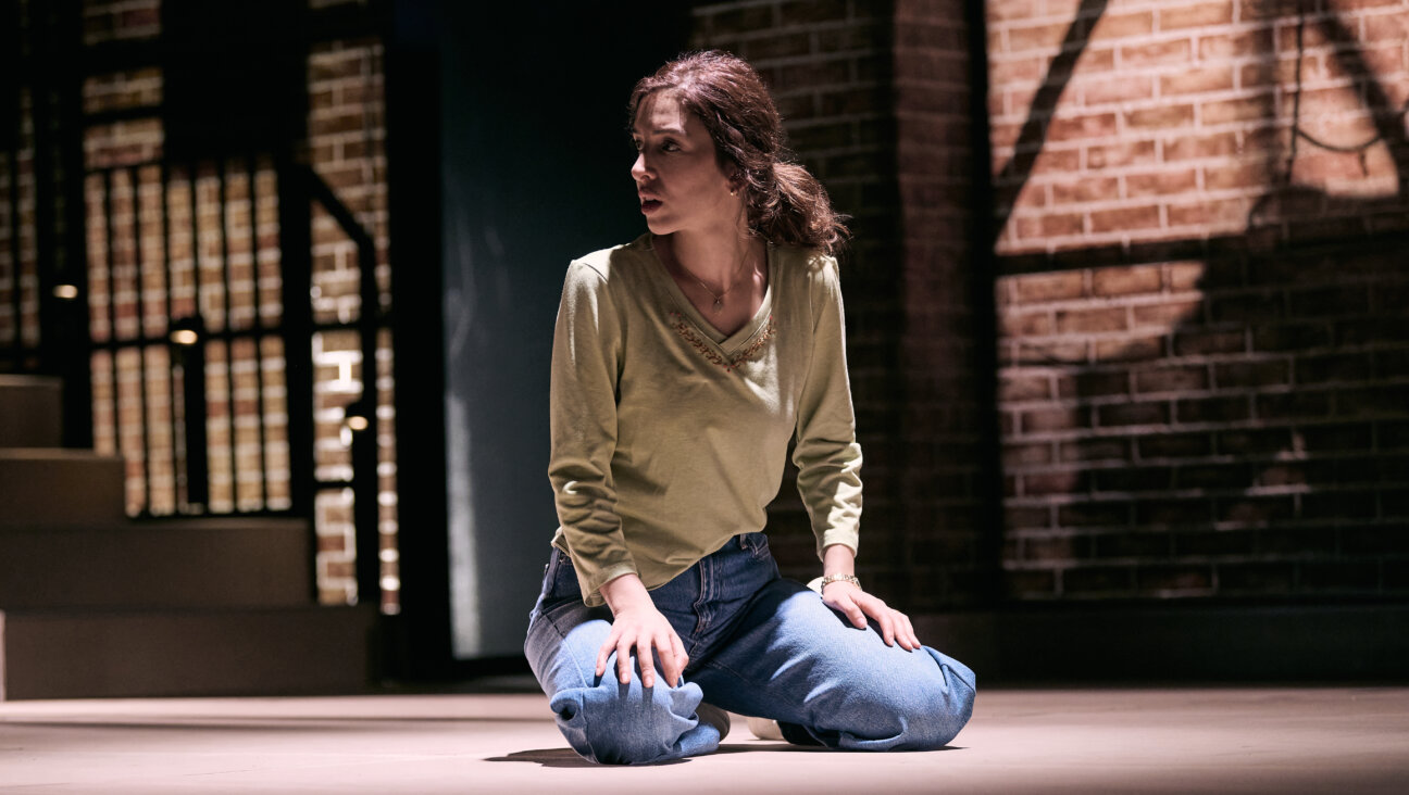 Khawla Ibraheem stars as Mariam: a woman surviving wartime Gaza in <i>A Knock on the Roof</i>, now playing at the New York Theater Workshop.