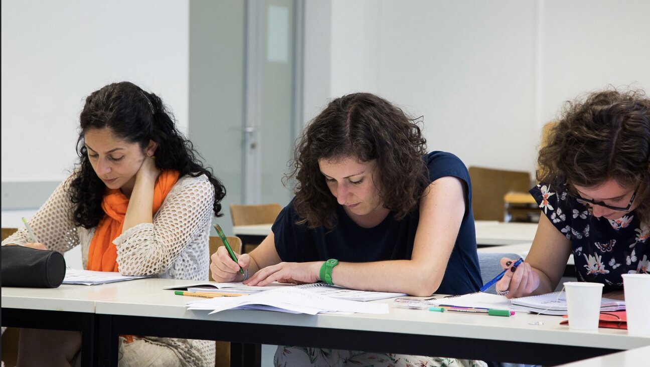 Students learning Yiddish at the Paris Yiddish Center