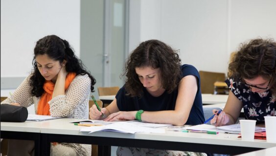 Students learning Yiddish at the Paris Yiddish Center