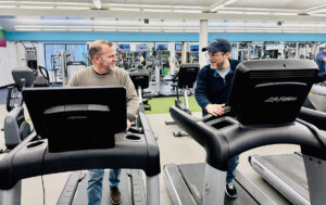 The Forward's Benyamin Cohen, right, interviewing Barak Hermann while on treadmills at a Baltimore JCC.