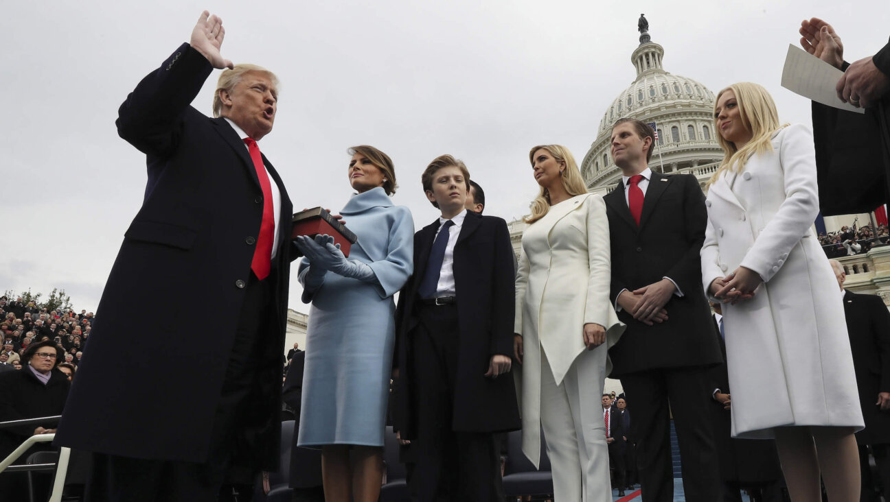 President-elect Donald Trump, left, takes the oath of office at his first inauguration, in 2017. 