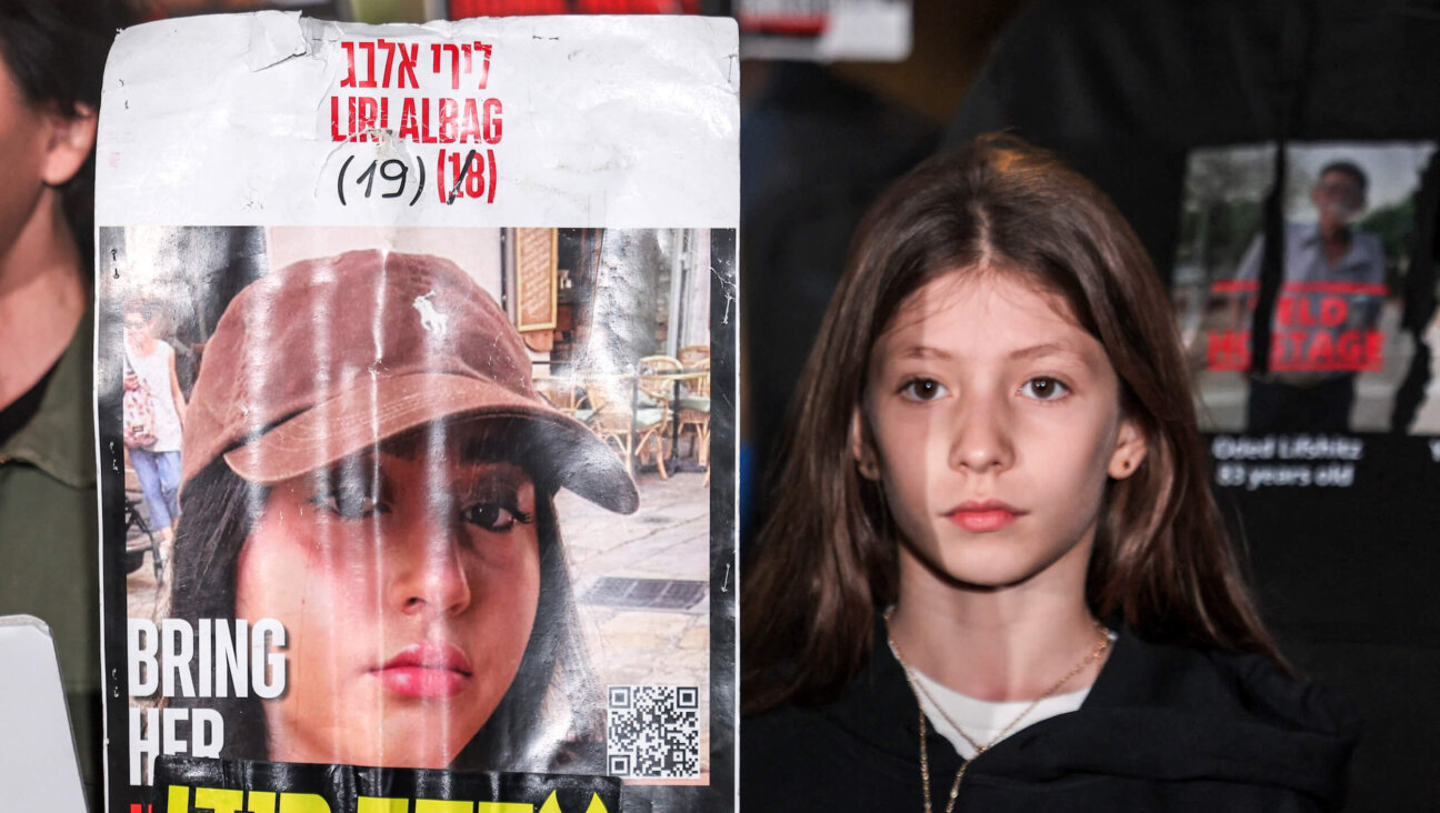 A relative of Liri Albag, an Israeli hostage taken captive by Palestinian militants to the Gaza Strip during the Oct. 7 attack, demonstrates with other family members in Tel Aviv on Jan. 4. 