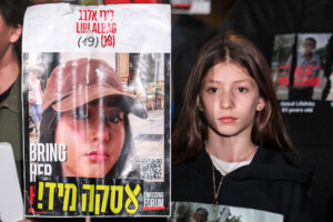 A relative of Liri Albag, an Israeli hostage taken captive by Palestinian militants to the Gaza Strip during the Oct. 7 attack, demonstrates with other family members in Tel Aviv on Jan. 4. 