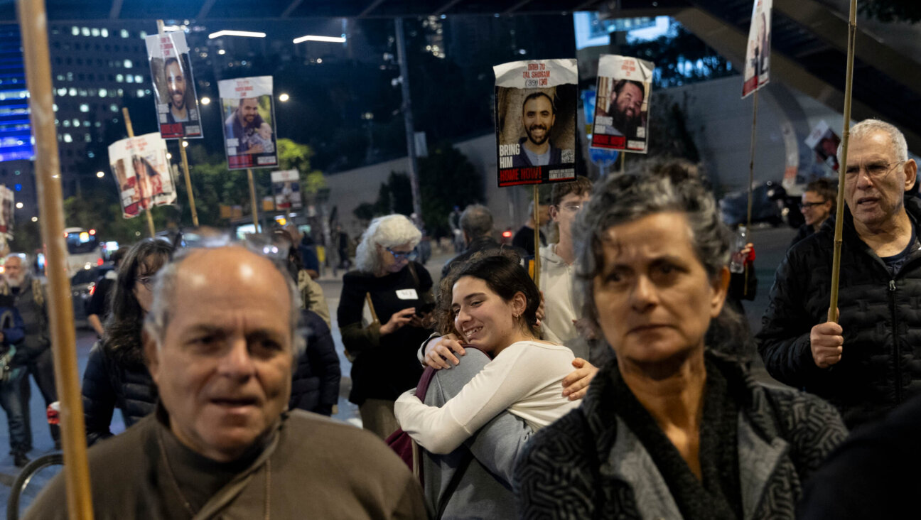 Tel Aviv protesters calling for the return of hostages react after a Gaza ceasefire and hostage release deal was reached on Jan. 15.