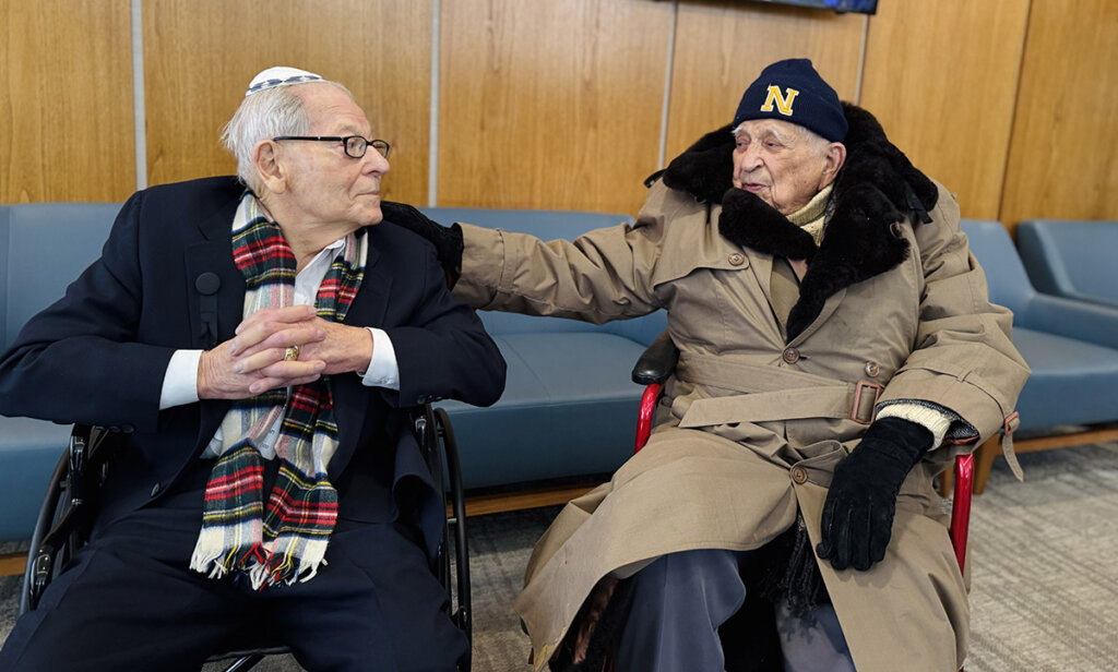 Retired Navy captains Norm Kaufman, left, and Bob Adler reminisce about their wives' decades-long friendship.