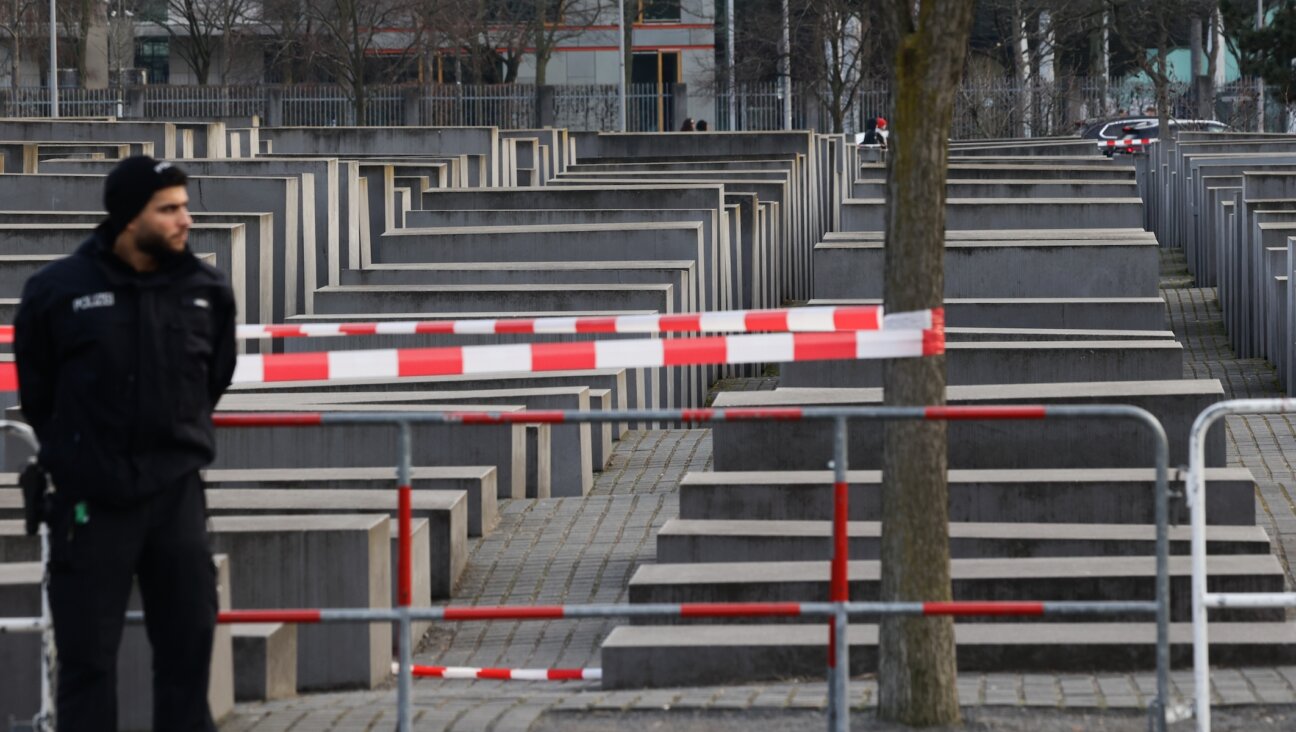 Police officers are seen near the Holocaust Memorial a day after stabbing in Berlin, Germany on February 22, 2025. (Jakub Porzycki/NurPhoto via Getty Images)