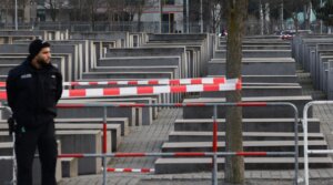 Police officers are seen near the Holocaust Memorial a day after stabbing in Berlin, Germany on February 22, 2025. (Jakub Porzycki/NurPhoto via Getty Images)