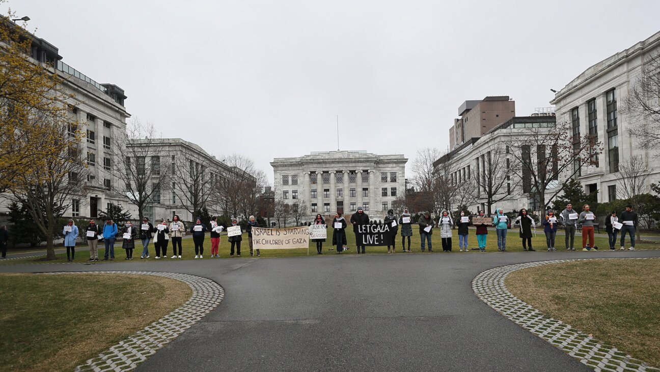 Dozens of Harvard Medical School faculty and students protested outside of the school on March 15, 2024. They were protesting an event featuring the president of the American Medical Association, over the powerful physicians’ group’s repeated refusal to call for a ceasefire in Gaza. (Suzanne Kreiter/The Boston Globe via Getty Images)