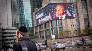 A large billboard posted by the Ayalon highway in Tel Aviv, in support of U.S. President Donald Trump, Feb. 5, 2025. (Miriam Alster/Flash90)