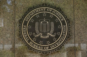 The FBI logo is seen outside the headquarters building in Washington, D.C., July 5, 2016. (Yuri Gripas/AFP/Getty Images)