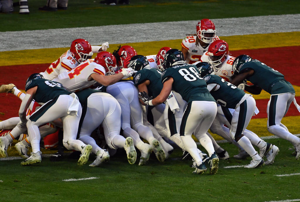 The Philadelphia Eagles push quarterback Jalen Hurts to a touchdown using the "tush push" against the Kansas City Chiefs at the 2023 Super Bowl.