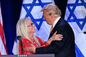 Donald Trump embraces mega donor Miriam Adelson on Sept. 19, 2024. 