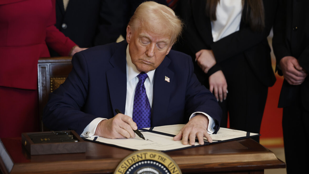 President Trump, signing one of many pieces of anti-immigration law he has said his administration plans.