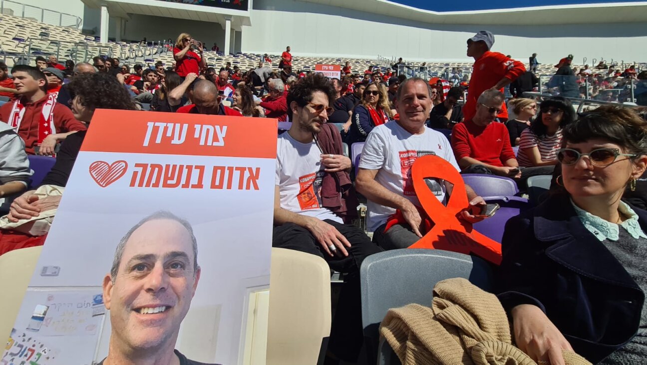 Friends, family and supporters of Tsachi Idan, who was killed in Hamas captivity, crowd Tel Aviv’s Bloomfield stadium, home to Hapoel Tel Aviv, for his funeral, Feb. 28, 2025. (Deborah Danan)