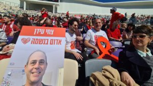 Friends, family and supporters of Tsachi Idan, who was killed in Hamas captivity, crowd Tel Aviv’s Bloomfield stadium, home to Hapoel Tel Aviv, for his funeral, Feb. 28, 2025. (Deborah Danan)