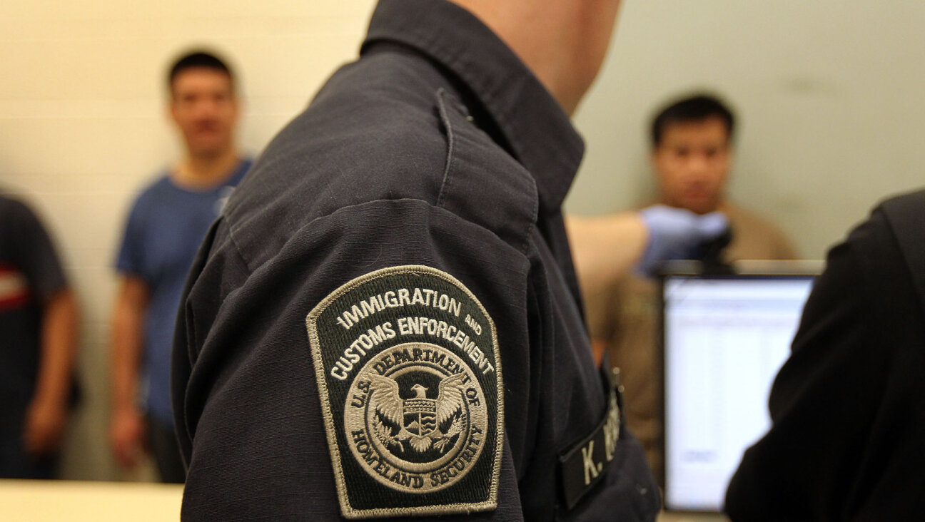 Undocumented Mexican immigrants are photographed while being processed at the Immigration and Customs Enforcement center in Phoenix, Ariz., April 28, 2010. (John Moore/Getty Images)