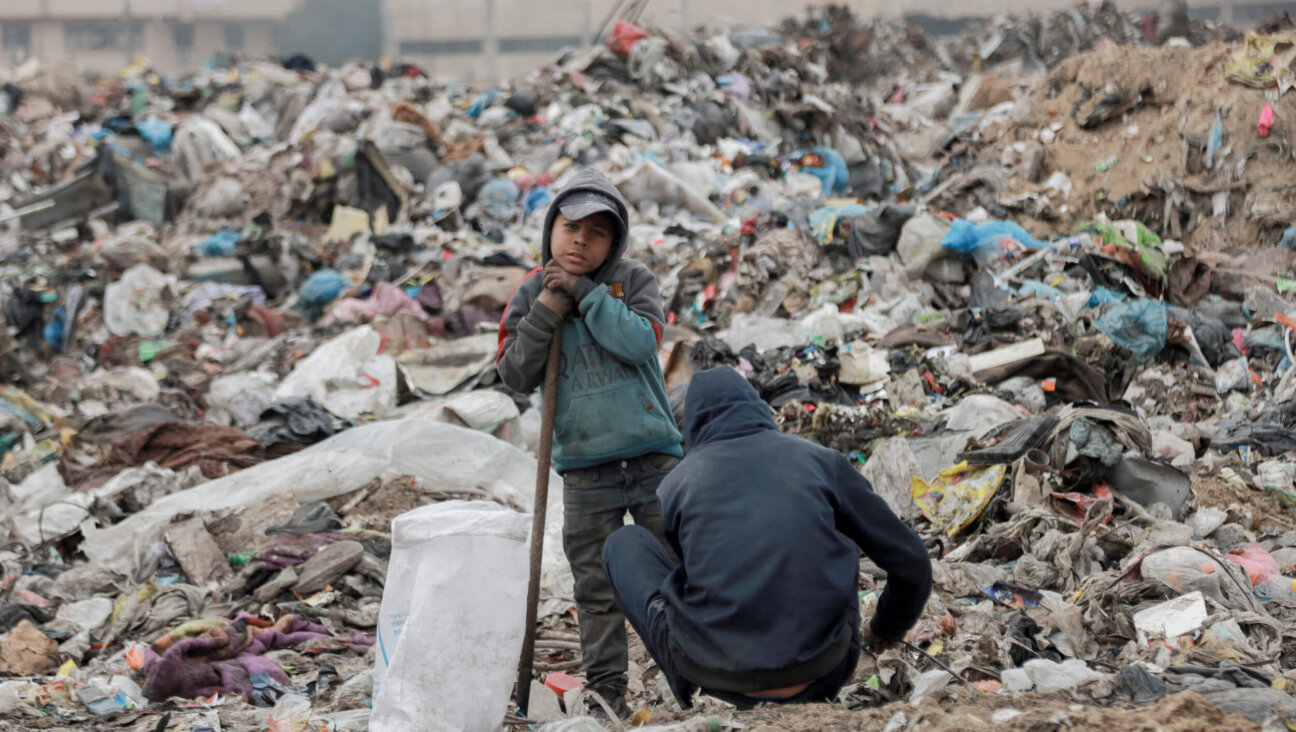 Two boys amid the rubble in Firas Square, Gaza City, on Feb. 8.