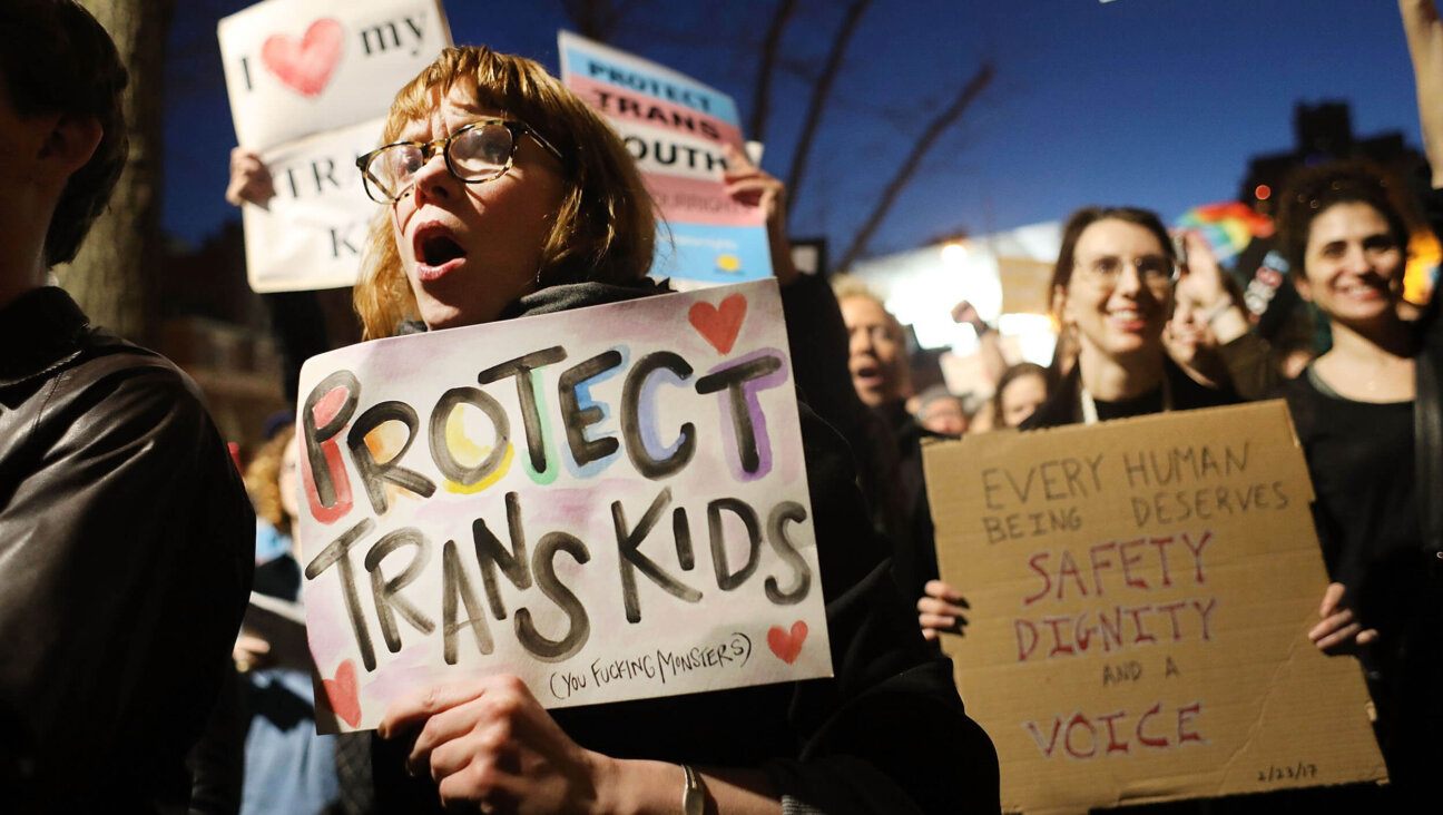 Demonstrators protest against President Donald Trump's approach to transgender issues during his first term, on Feb. 23, 2017.