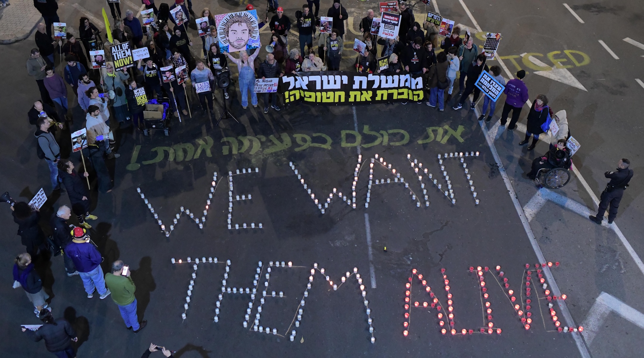 Demonstrators protest for the release of Israelis held hostage in the Gaza Strip, outside Hakirya Base in Tel Aviv, March 5, 2025. (Tomer Neuberg/Flash90)