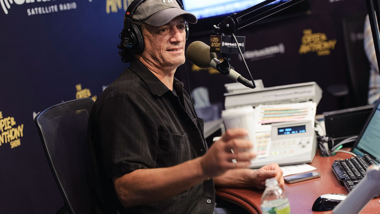 Anthony Cumia hosting The Opie & Anthony Show at SiriusXM Studios on August 13, 2012 in New York City. 