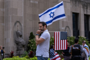 A pro-Irsael protester demonstrates near the Consulate General of Israel during the second day of the Democratic National Convention on Aug. 20 in Chicago.