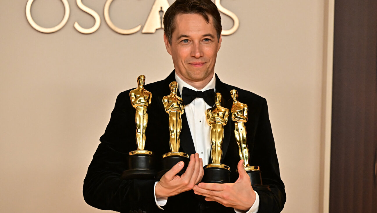 Sean Baker became the first director to win four Oscars for the same film when he won for writing, editing, directing, and Best Picture.