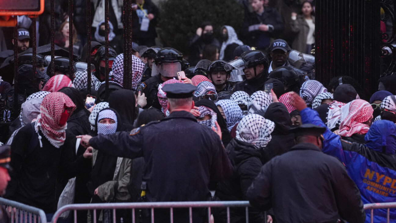 NYPD officers clear pro-Palestinian demonstrators from the Barnard library after a group of student protesters occupied it on Wednesday. (Lokman Vural Elibol/Anadolu via Getty Images)