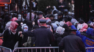 NYPD officers clear pro-Palestinian demonstrators from the Barnard library after a group of student protesters occupied it on Wednesday. (Lokman Vural Elibol/Anadolu via Getty Images)