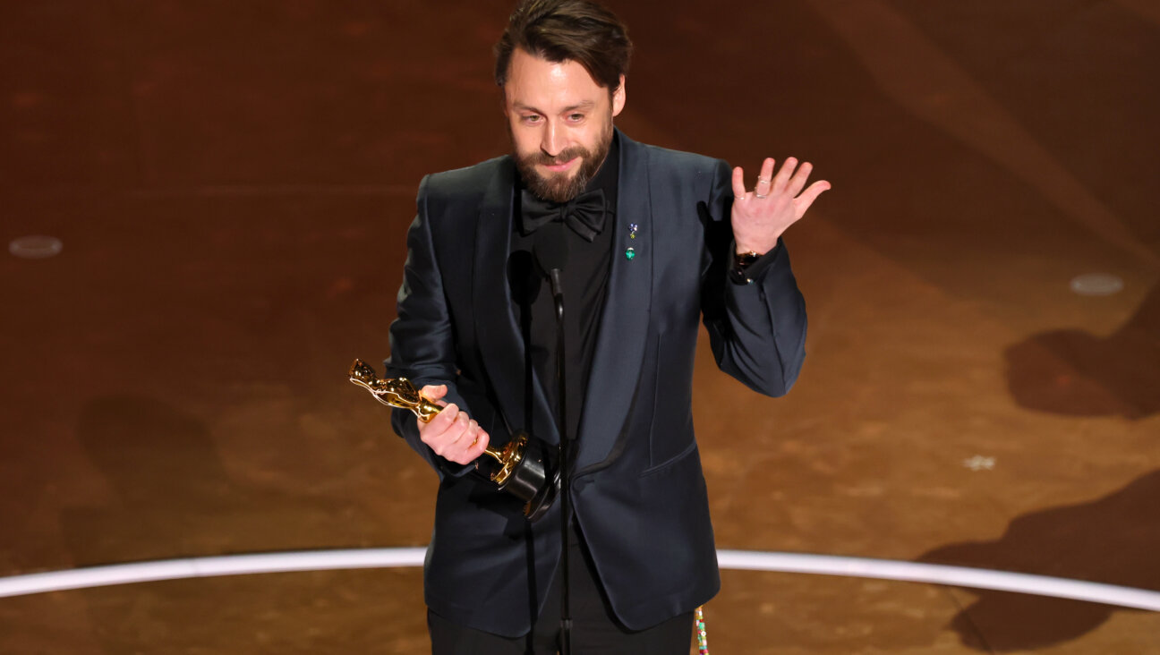 Kieran Culkin accepts the Best Actor In A Supporting Role award for "A Real Pain." 