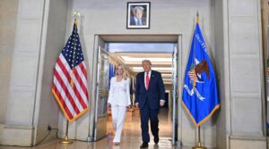 US President Donald Trump and Attorney General Pam Bondi arrive to speak at the Department of Justice in Washington, DC, on March 14, 2025. (Roberto Schmidt/AFP via Getty Images)