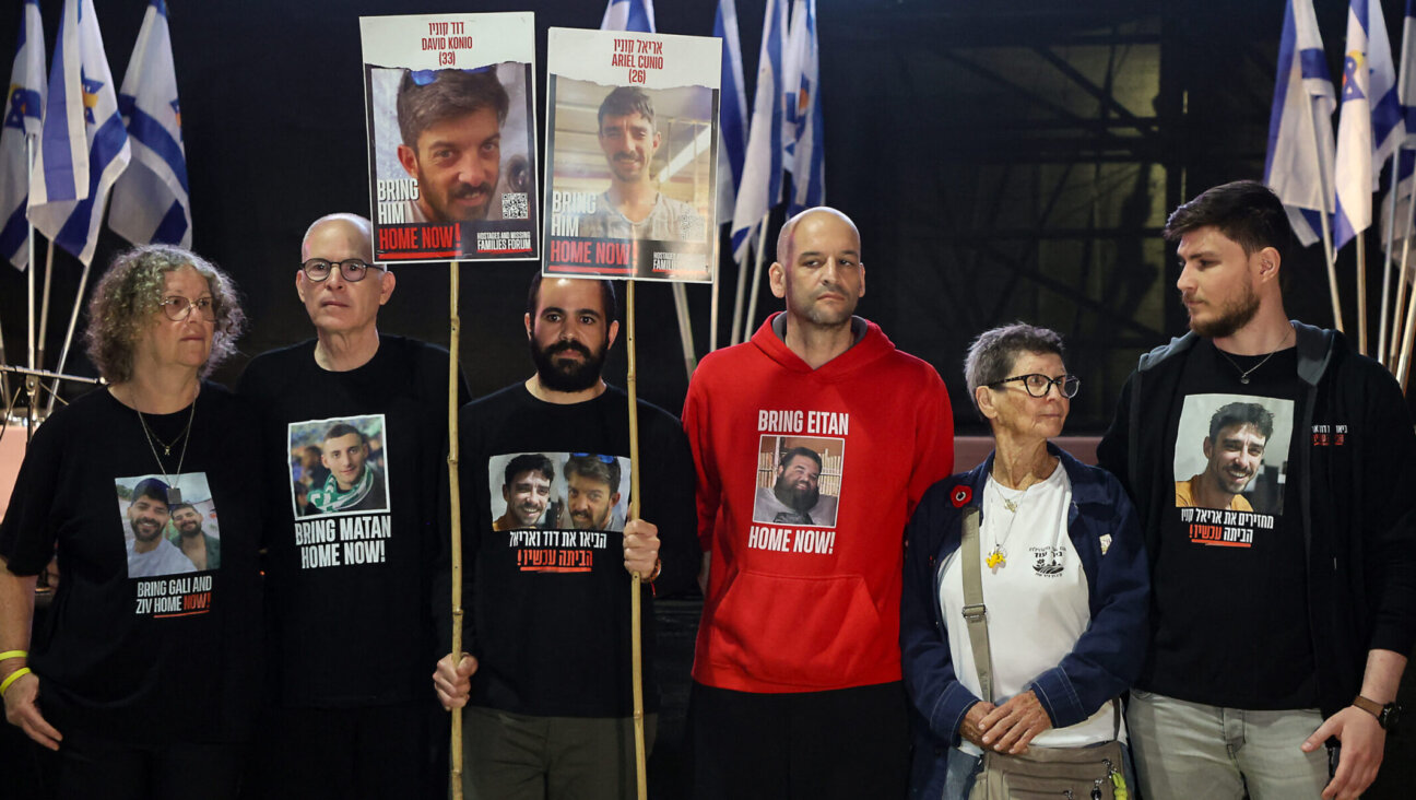 Freed Israeli hostages Aviva Siegel, Keith Siegel, Yarden Bibas, Yair Horn, Yocheved Lifshitz and Sasha Trufanov hold a protest calling for the end of the war and the release of the remaining Israeli hostages held captive in Gaza in Tel Aviv’s Hostages Square, March 18, 2025. (Gil Cohen-Magen/AFP via Getty Images)